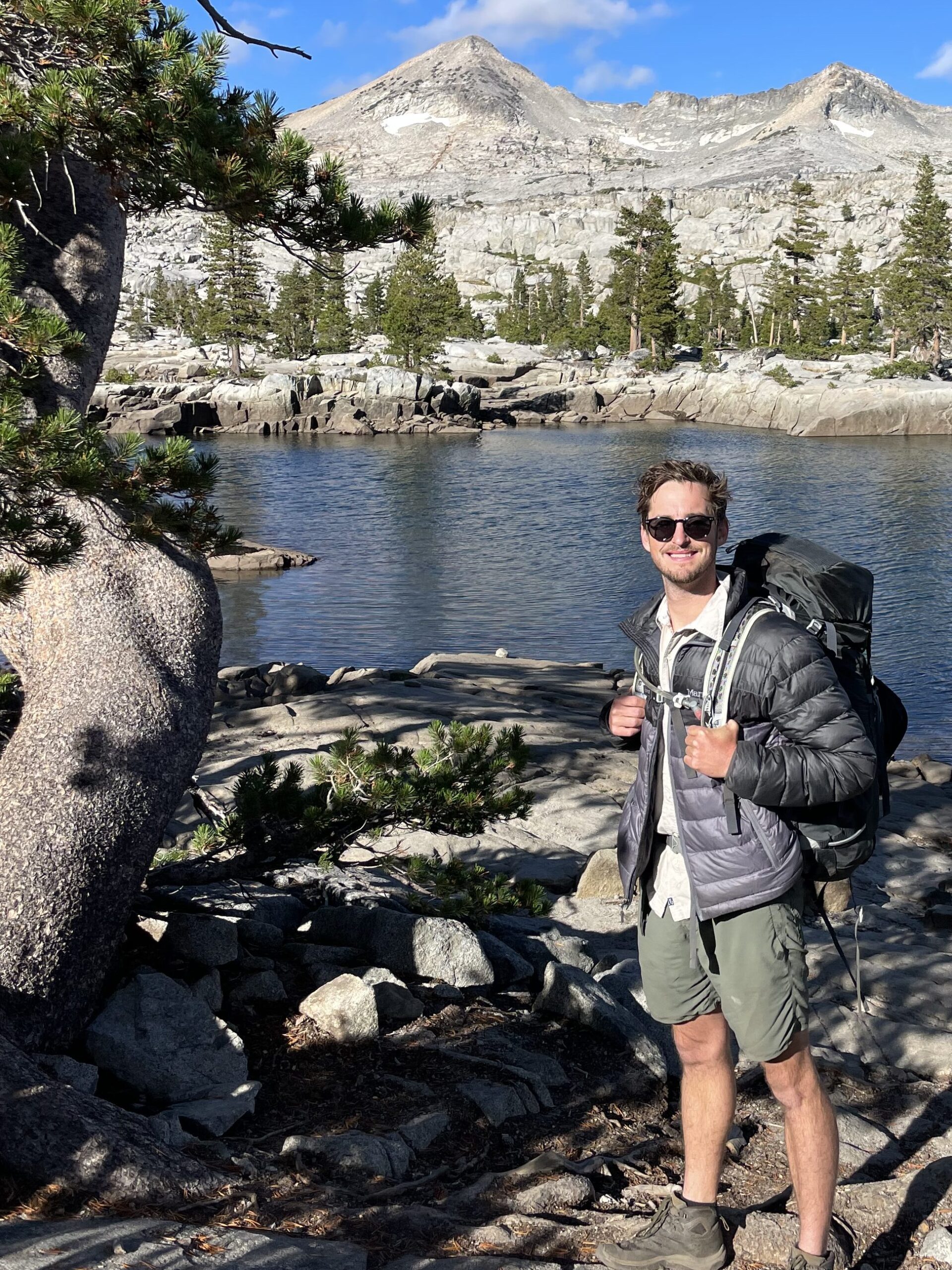 Kyle Justice hiking in the mountains